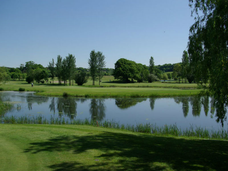 Play a game of golf at Dudsbury Golf Club in Dorset, England